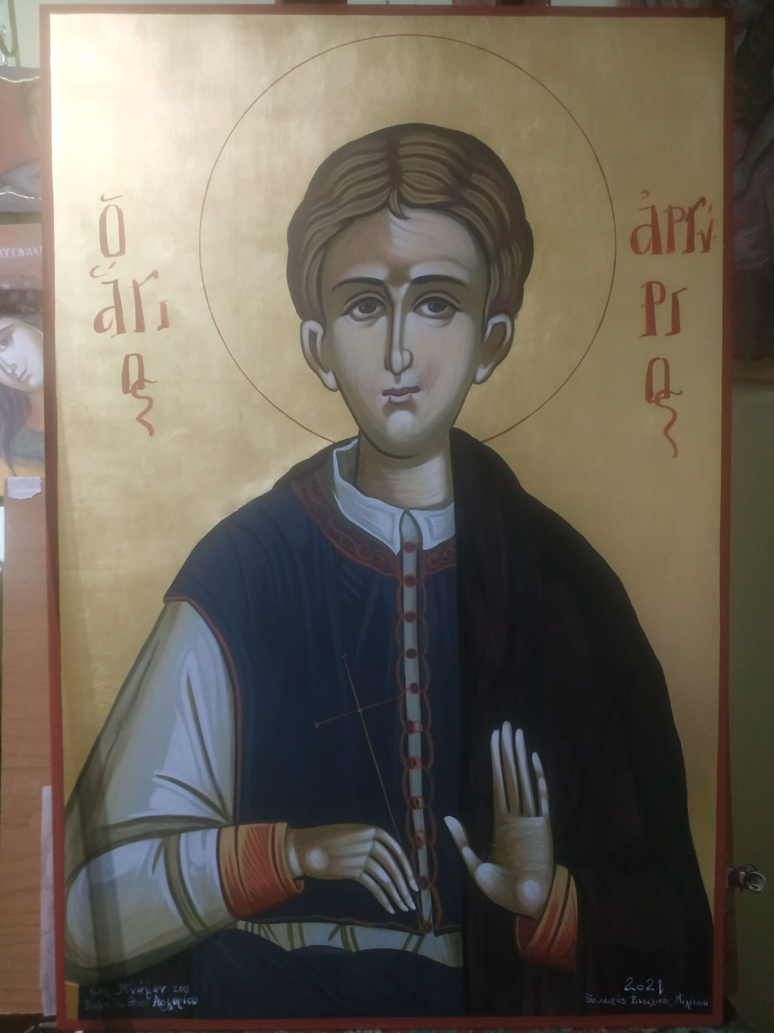 Byzantine Icon of Saint Argyrios holding a cross, while dressed in traditional 18th century clothing