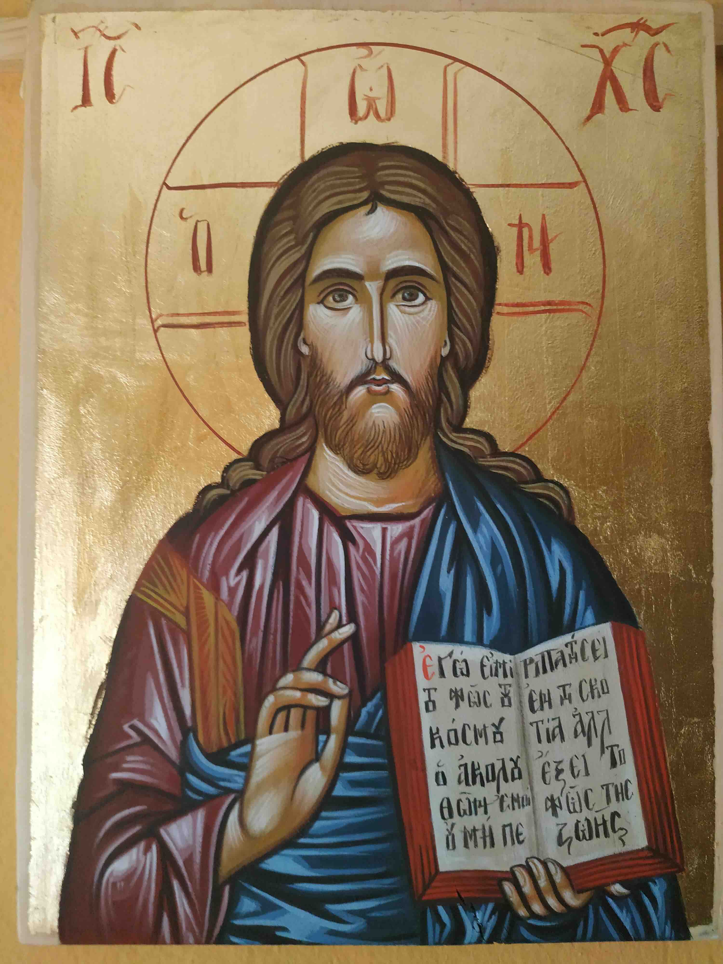 Byzantine Icon of Jesus Christ blessing everyone with his right hand and holding a holy book with his left hand