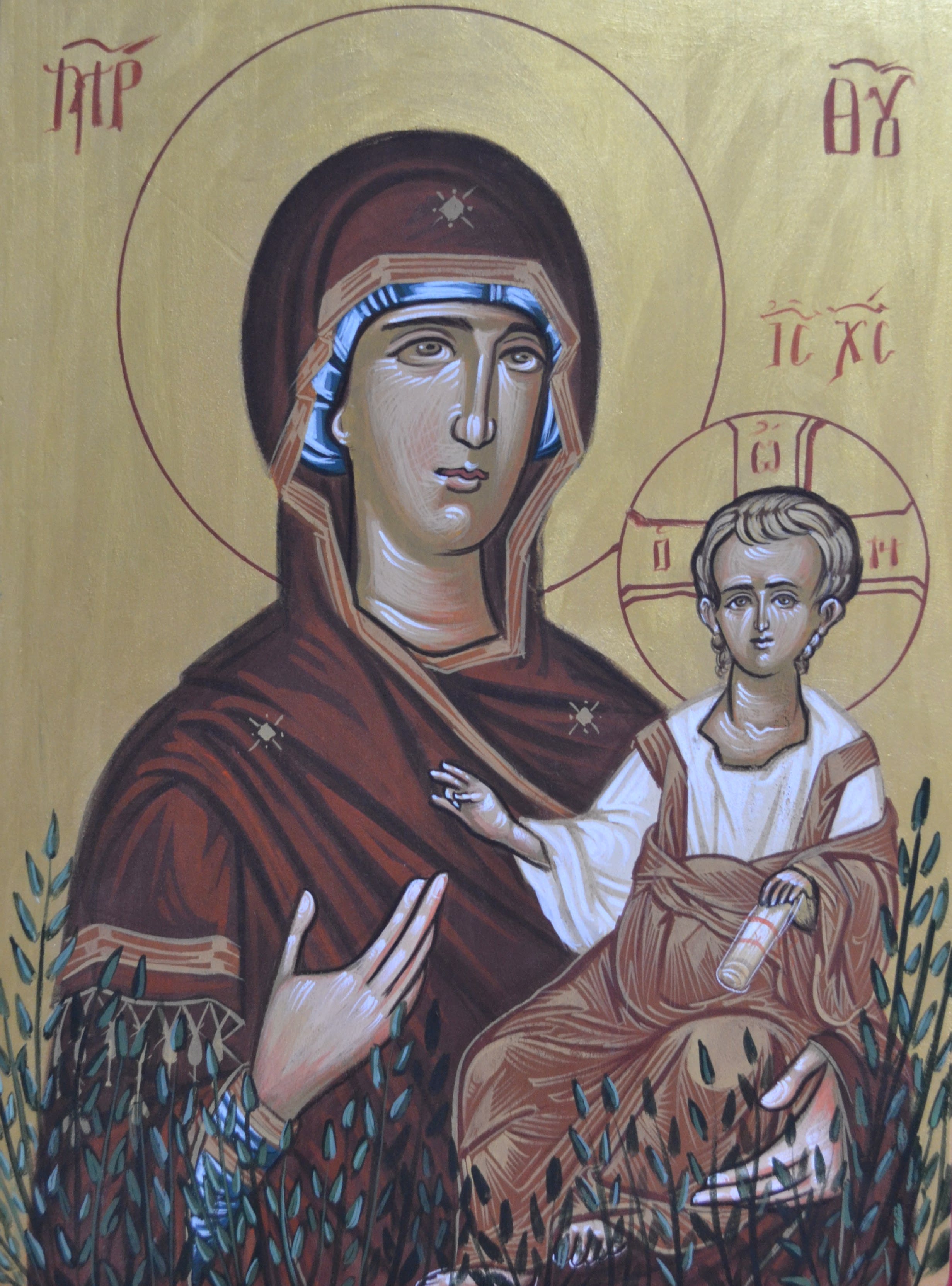 Holy Mary of Kythira holding Christ in her lef hand while Christ is blessing everyone, both of them surrounded by vegetation